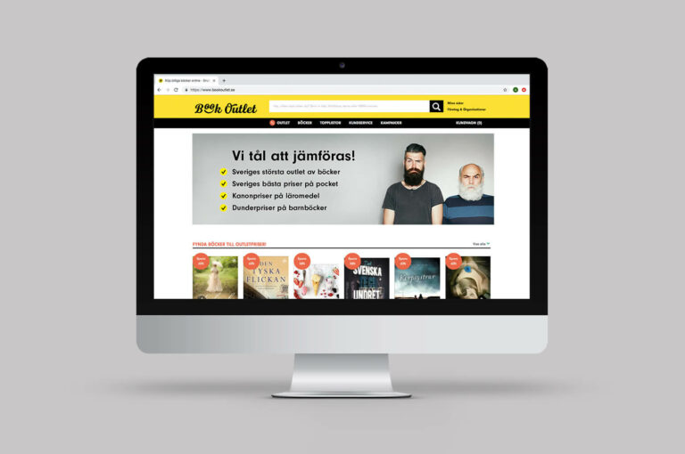 Dator med Book Outlets hemsida