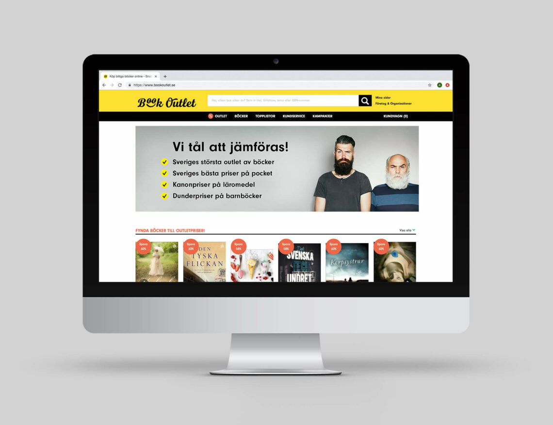 Dator med Book Outlets hemsida